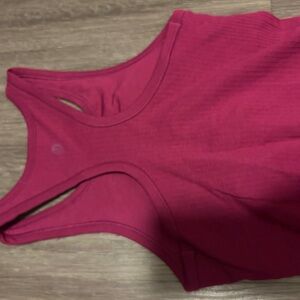 Lululemon Ebb to Street Cropped Racerback top, size 4.